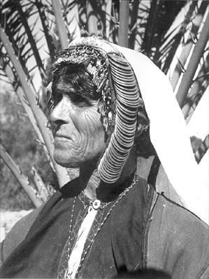 Old Palestinian woman wearing traditional dress