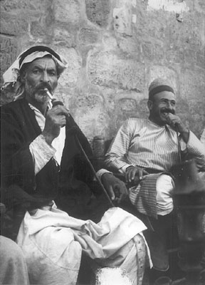 Palestinian men smoking nargila